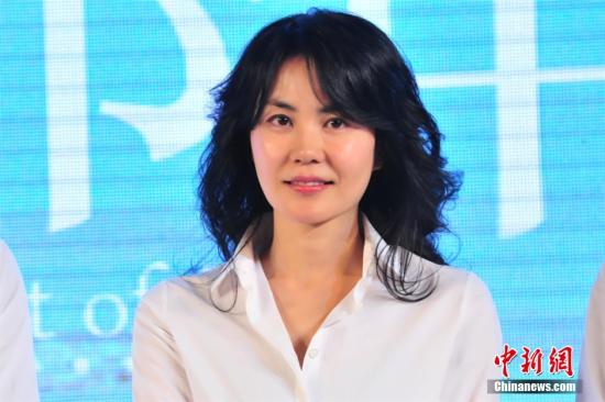 王菲现身房产中心引网友猜测：为前夫卖房（图）